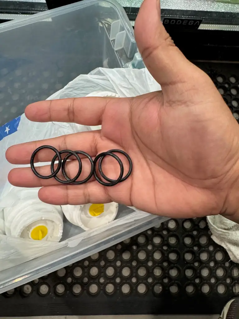 Worn O-rings removed from commercial beverage equipment