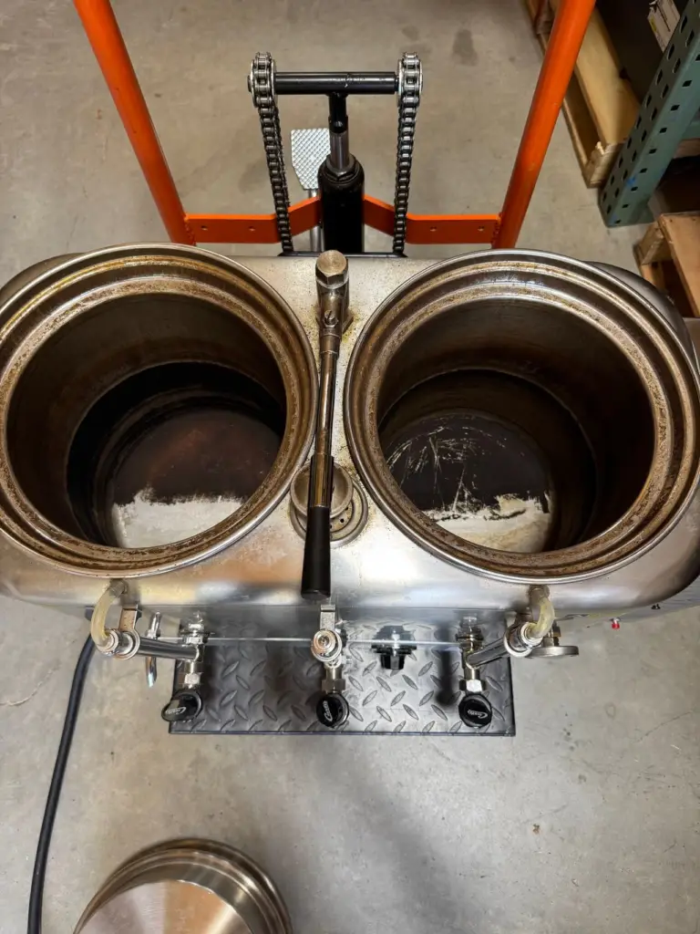 Curtis twin coffee urn with covers removed showing old coffee buildup inside both drums